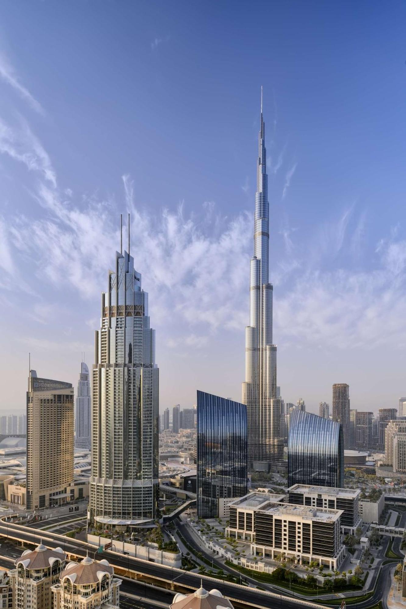 Kempinski The Boulevard Dubai Eksteriør billede The tower (right) with the Burj Khalifa (left)